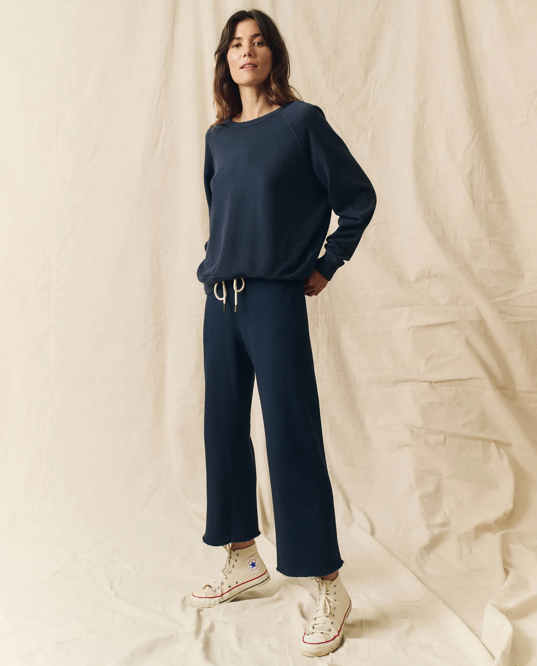 The Wide Leg Cropped Sweatpant. -- True Navy