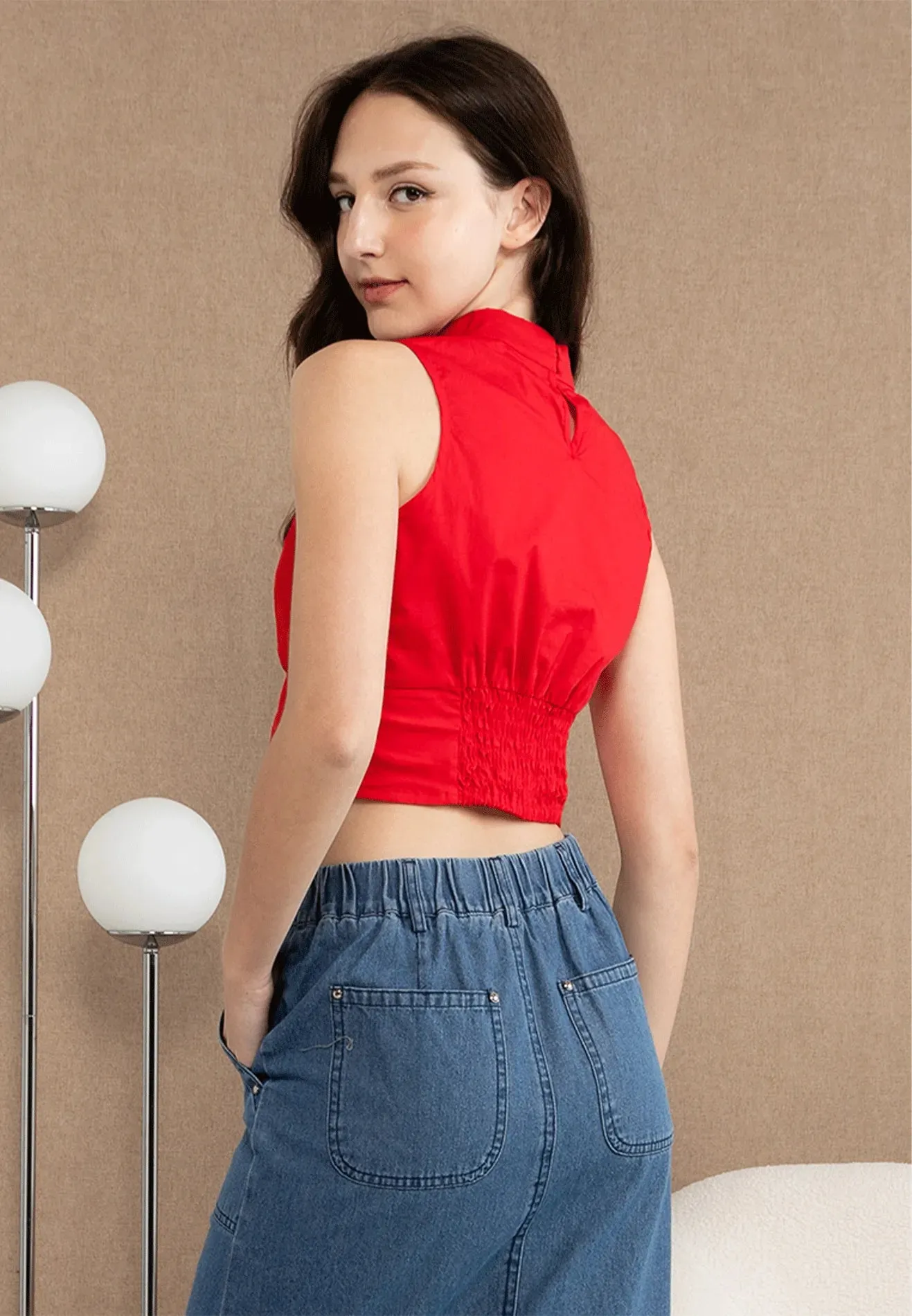 VOIR JEANS Sleeveless Mandarin Collar Knot Crop Top